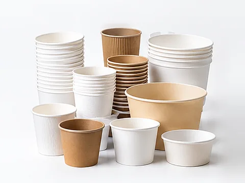 White and brown paper cups and bowls